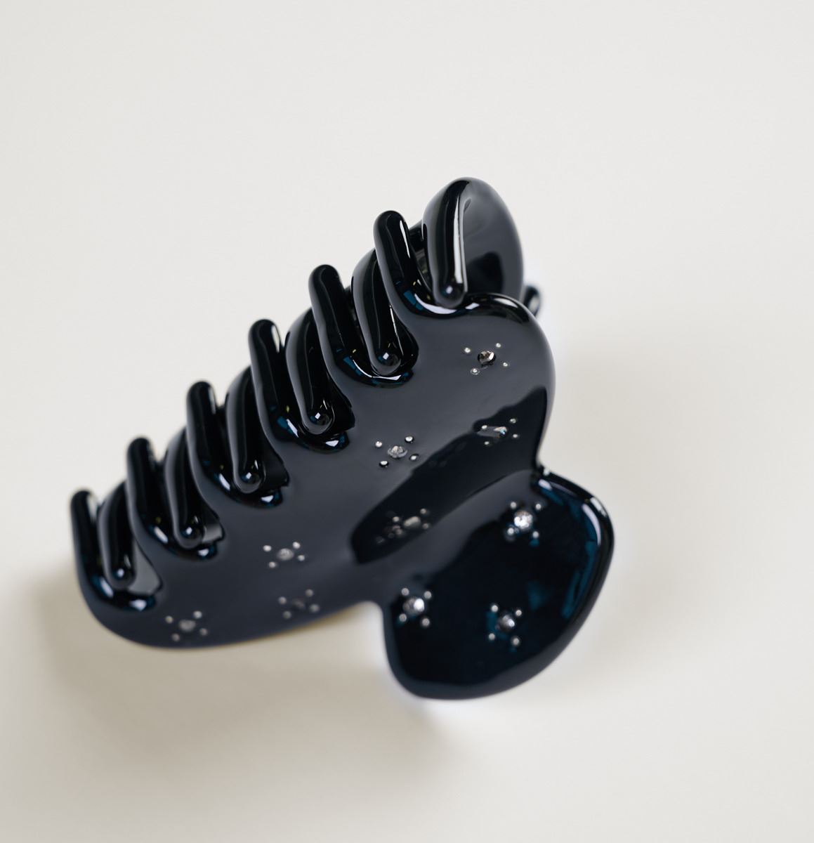 Juukseklamber must - 2